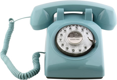 An old rotary style phone, light blue in colour
